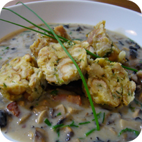 Brezenknödel mit Pilzragout